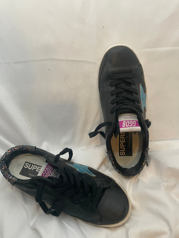 Golden Goose Super-Star low-top leather sneakers in black with a contrasting blue star and glitter heel tab. Size 37 Women&