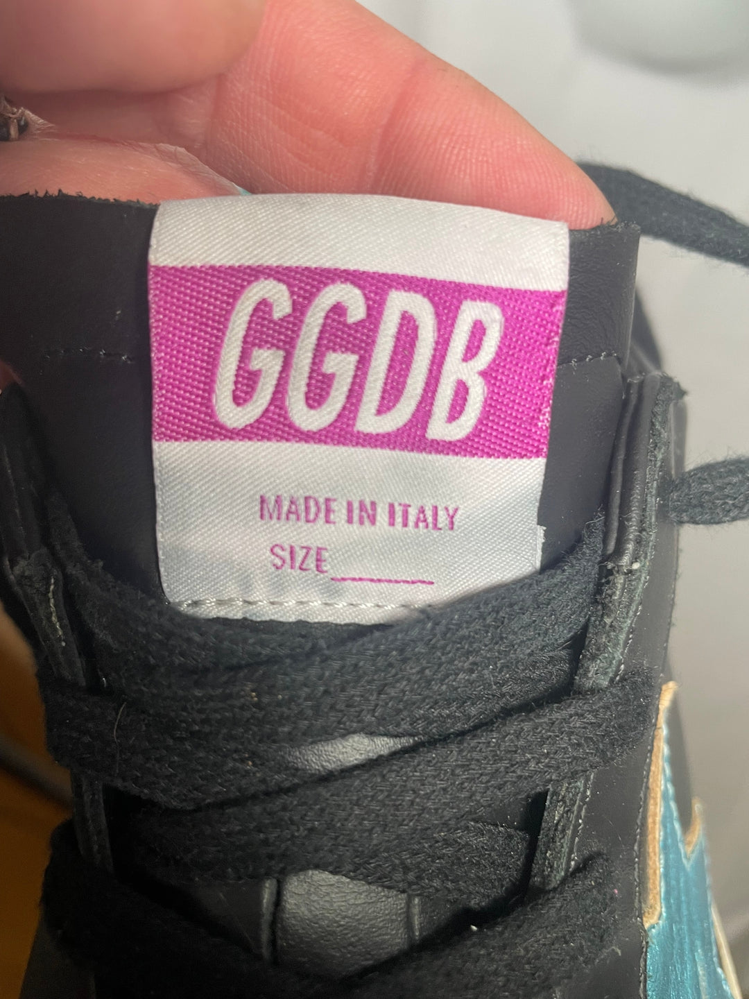 Golden Goose Super-Star low-top leather sneakers in black with a contrasting blue star and glitter heel tab. Size 37 Women&