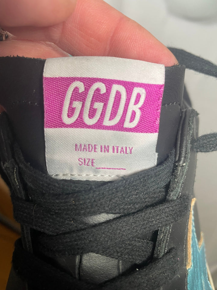 Golden Goose Super-Star low-top leather sneakers in black with a contrasting blue star and glitter heel tab. Size 37 Women&