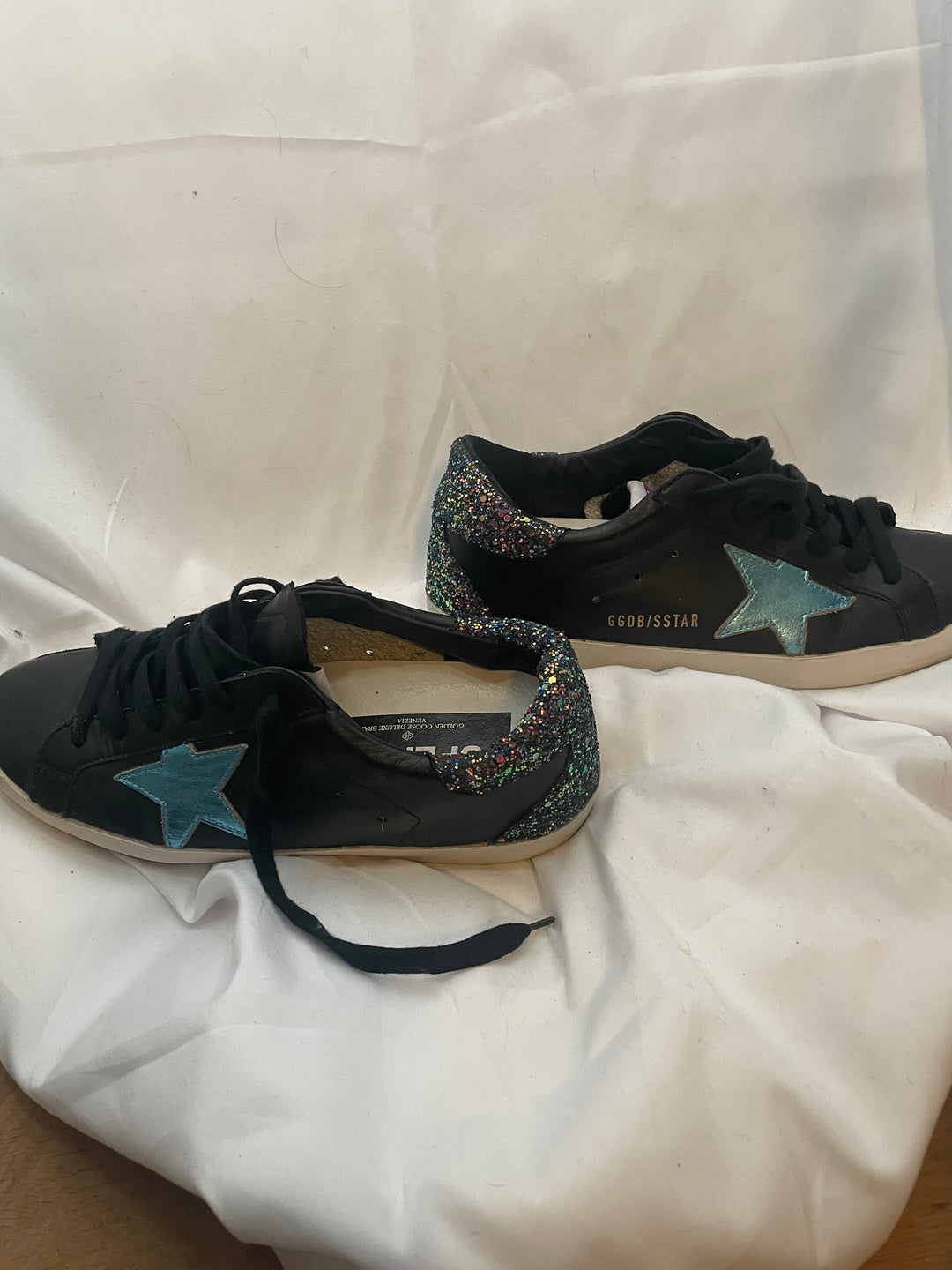 Golden Goose Super-Star low-top leather sneakers in black with a contrasting blue star and glitter heel tab. Size 37 Women&