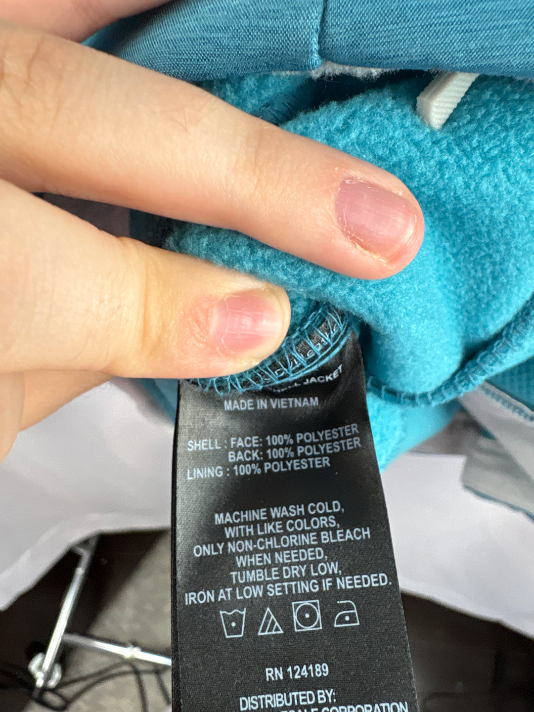 Women’s Kirkland Signature Medium Teal Rain Jacket