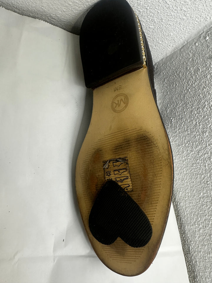 Michael Kors Chelsea boot with pebbled leather and stylish chain